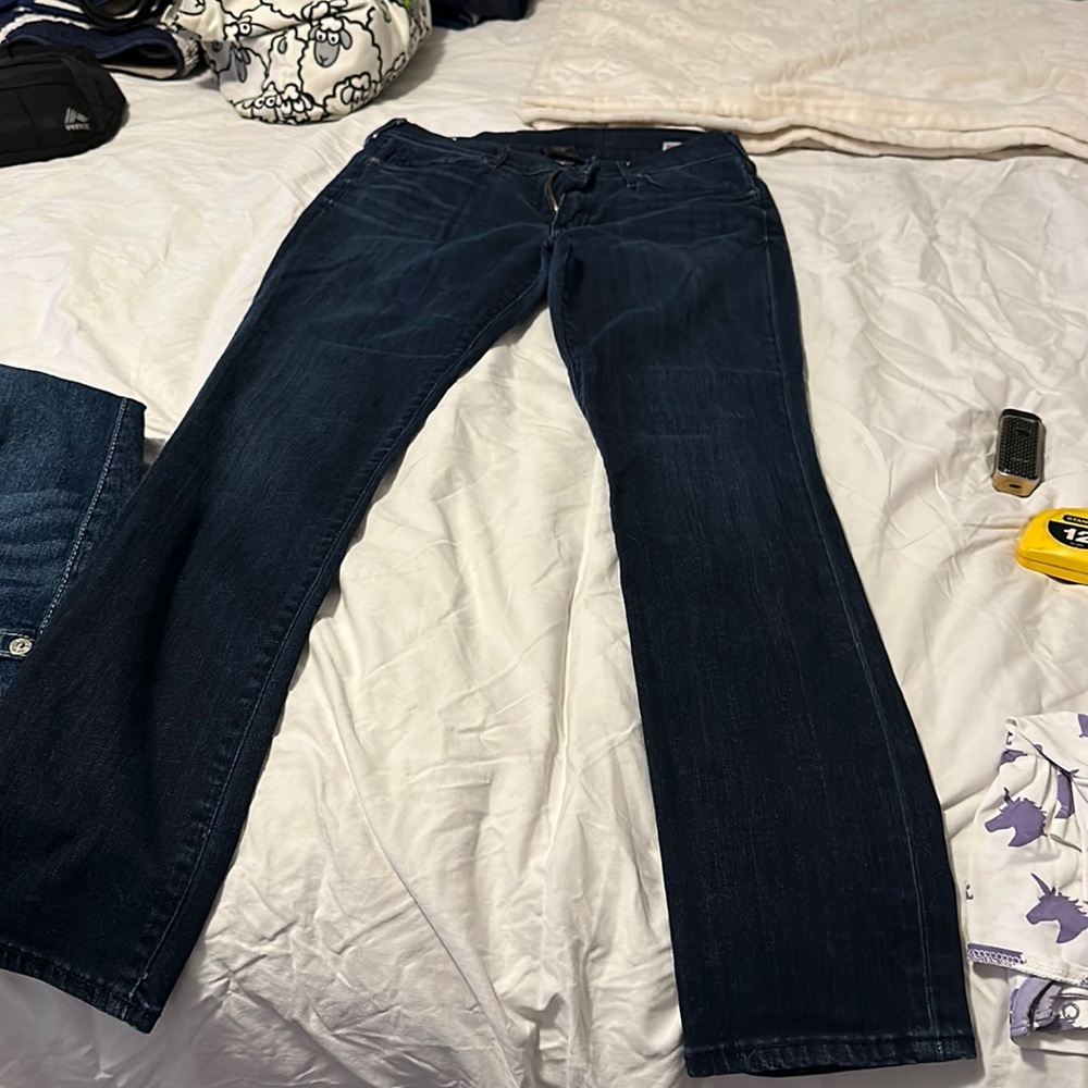 Skinny darker blue jeans